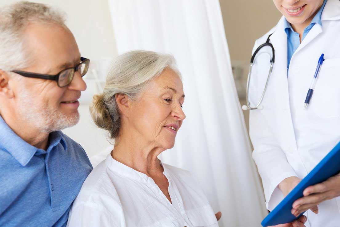 Older adults reviewing care information with a clinician